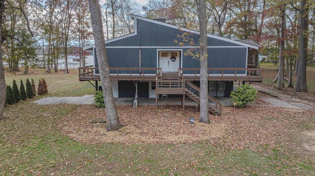 view of front of house featuring a deck and stairway