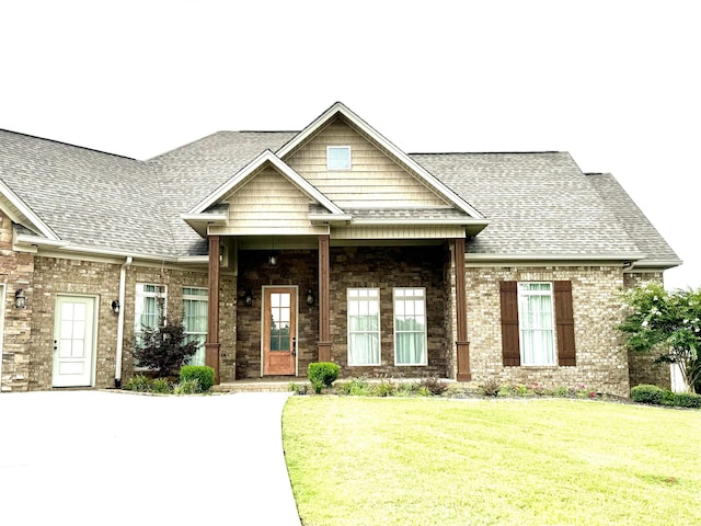 view of front of home with a front yard