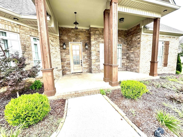 entrance to property featuring a porch