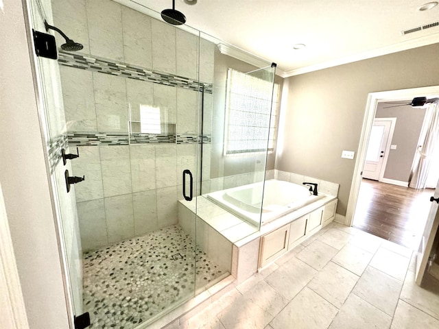 bathroom featuring tile patterned floors, crown molding, and plus walk in shower