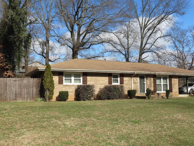 single story home with a front yard