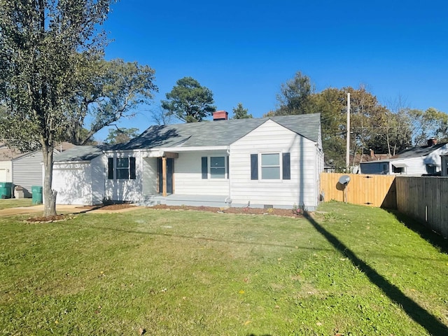 ranch-style home with a front yard