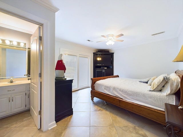 tiled bedroom with ceiling fan, crown molding, sink, and connected bathroom