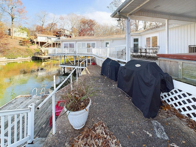 dock area featuring a water view