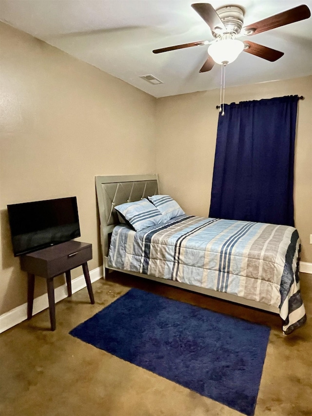 carpeted bedroom with baseboards, visible vents, and ceiling fan