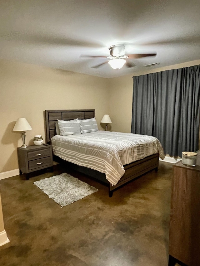 bedroom with a ceiling fan, visible vents, and baseboards