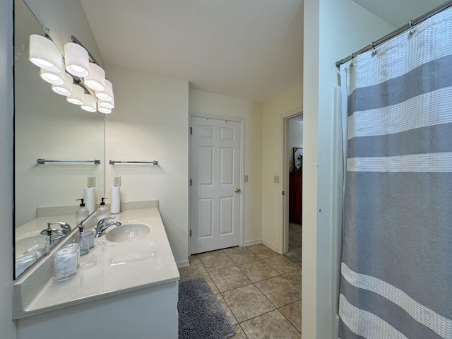 bathroom featuring tile patterned floors and vanity