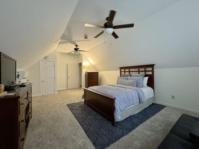 carpeted bedroom featuring ceiling fan and vaulted ceiling