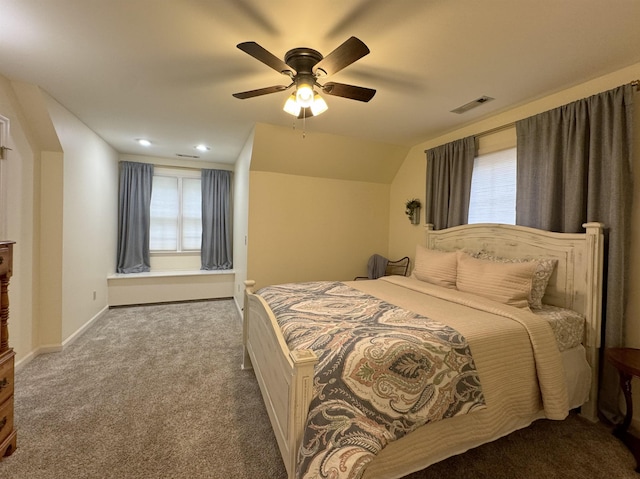 carpeted bedroom featuring ceiling fan and lofted ceiling