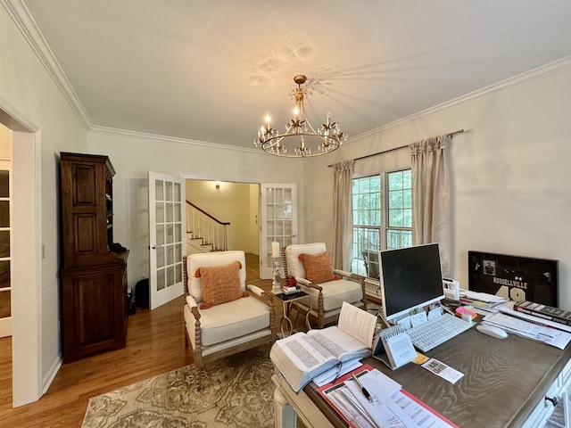 office area featuring an inviting chandelier, wood-type flooring, crown molding, and french doors