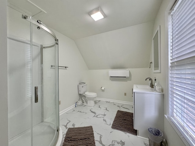 bathroom with vanity, toilet, a shower with shower door, and vaulted ceiling