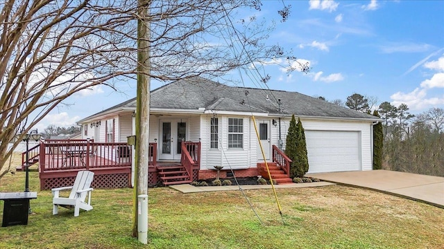 ranch-style house with a garage and a front yard