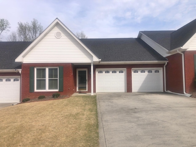 ranch-style house with a front yard and a garage