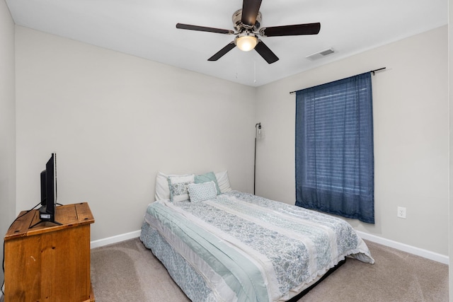 carpeted bedroom featuring ceiling fan