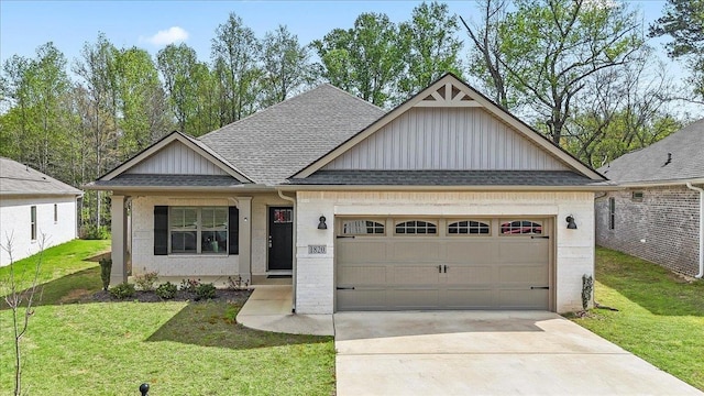  - craftsman house with board and batten siding, driveway, roof with shingles, a front lawn, and an attached garage
