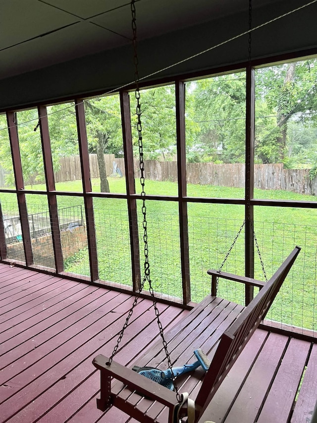  - unfurnished sunroom featuring healthy amount of natural light