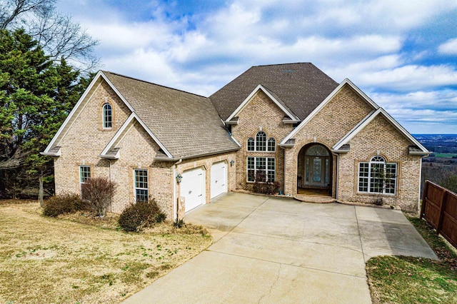 view of front of property featuring french doors and a garage