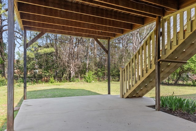  - view of patio featuring stairway
