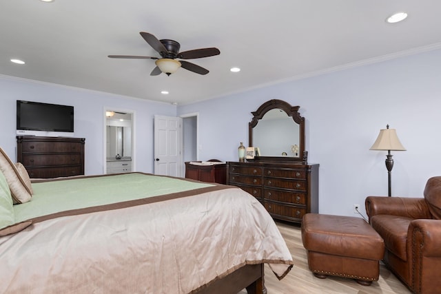 bedroom with ensuite bath, light hardwood / wood-style flooring, ceiling fan, and ornamental molding