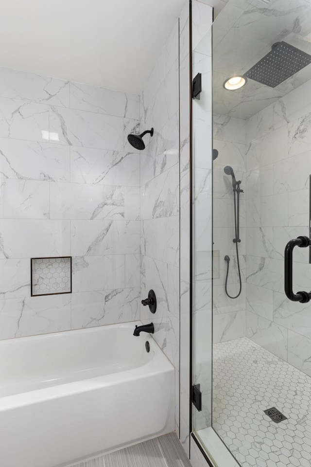 bathroom featuring tile patterned floors and plus walk in shower