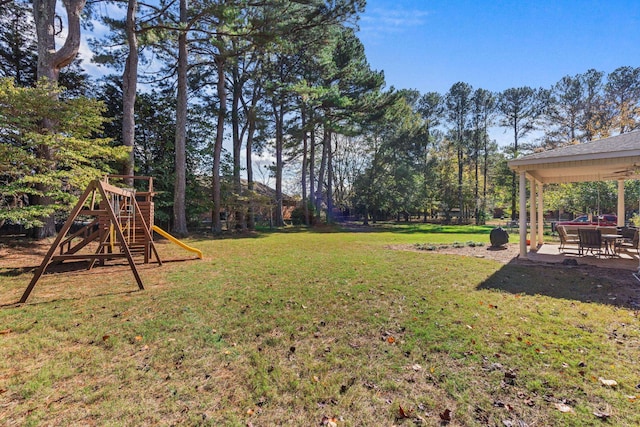 view of yard with a playground