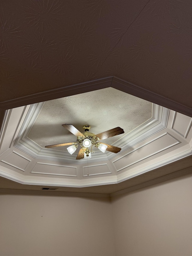 details with ceiling fan and crown molding