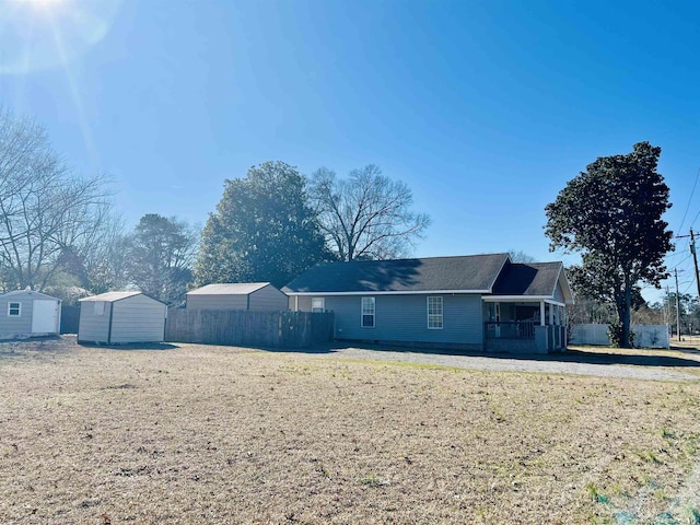 view of front of home with a storage unit