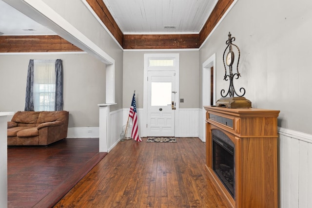 foyer entrance featuring dark hardwood / wood-style floors