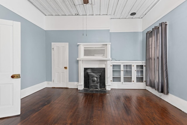 unfurnished living room featuring hardwood / wood-style flooring