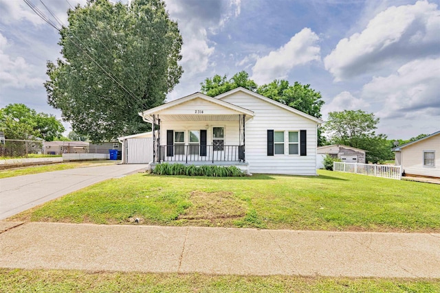 bungalow-style home with a porch
