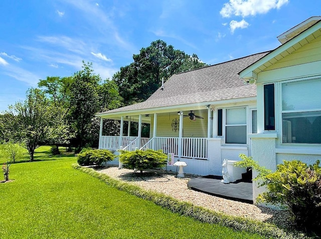 view of front of house with a front lawn and a porch