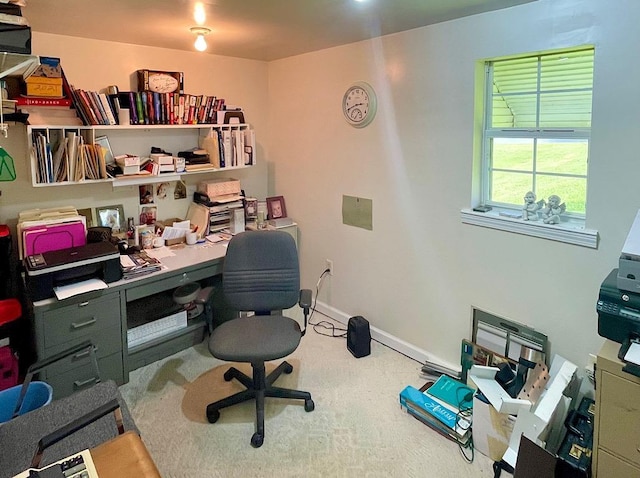 home office with carpet flooring