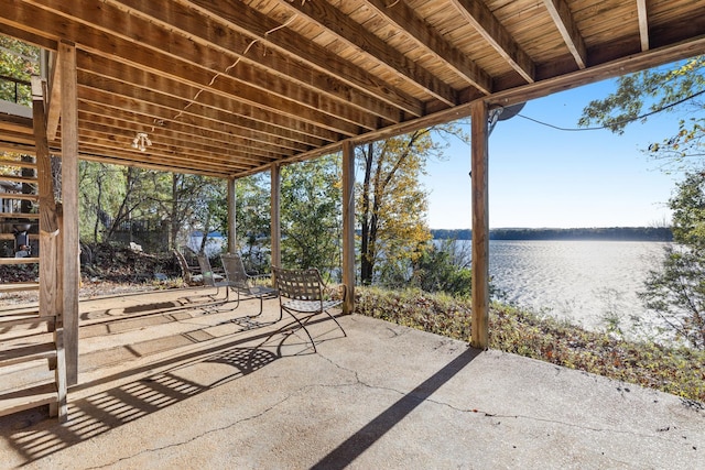 view of patio / terrace with a water view