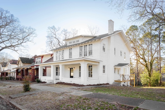 view of front of property featuring covered porch