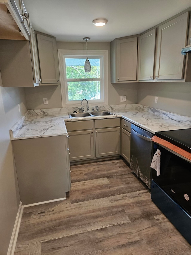 kitchen with gray cabinets, sink, stainless steel dishwasher, and dark hardwood / wood-style floors