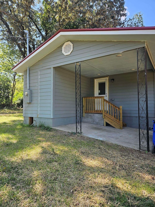 exterior space featuring a lawn