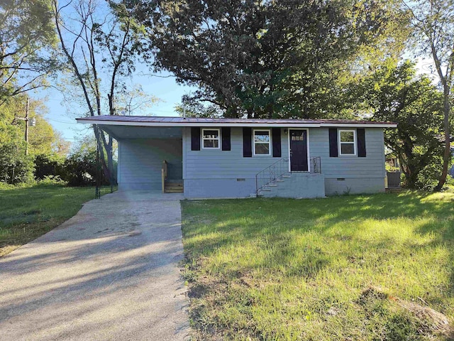 single story home featuring a front yard and a carport