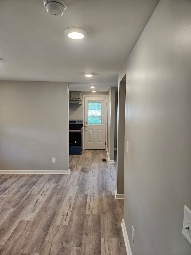 hallway featuring light wood-type flooring