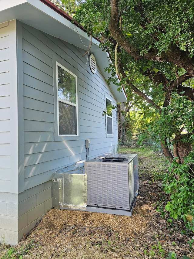 view of home's exterior featuring cooling unit