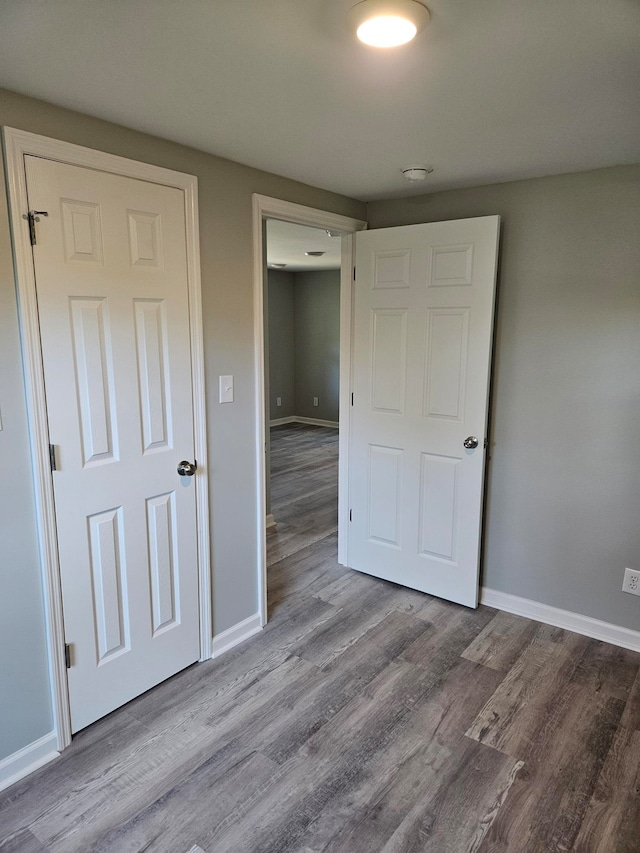 unfurnished bedroom with light hardwood / wood-style floors