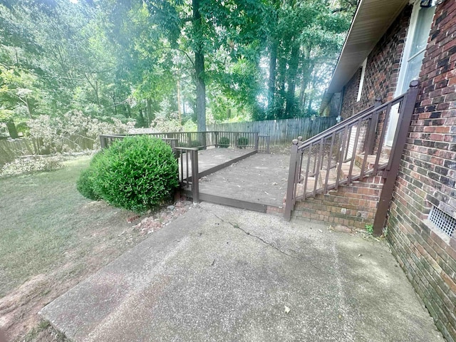 view of patio with a wooden deck