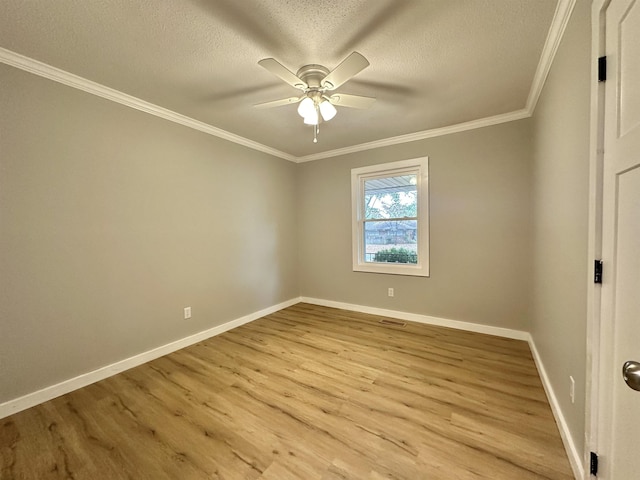 unfurnished room with crown molding, ceiling fan, light hardwood / wood-style floors, and a textured ceiling