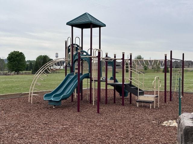 view of playground featuring a lawn