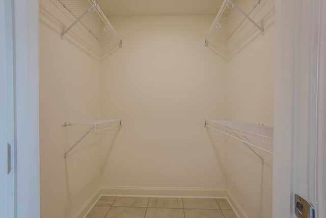 walk in closet featuring tile patterned floors