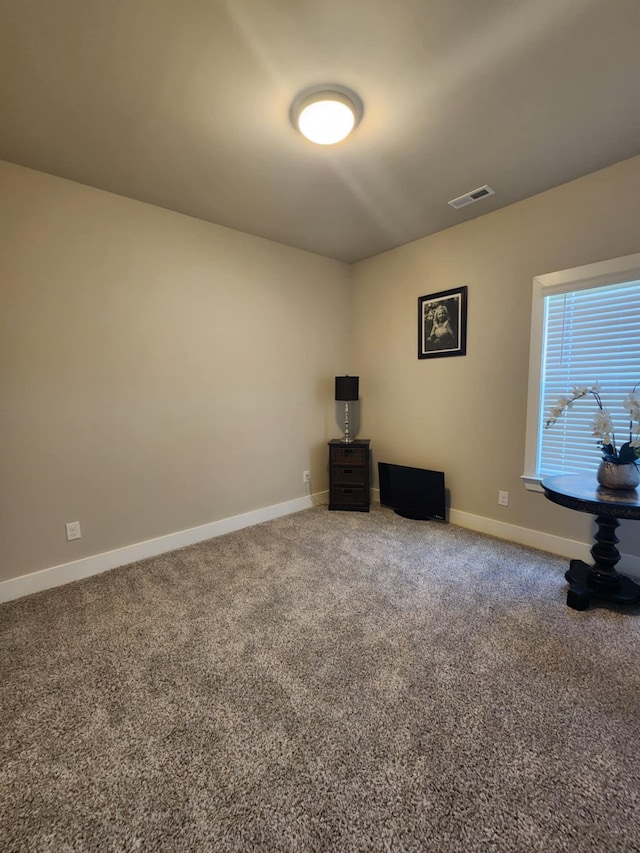 view of carpeted spare room