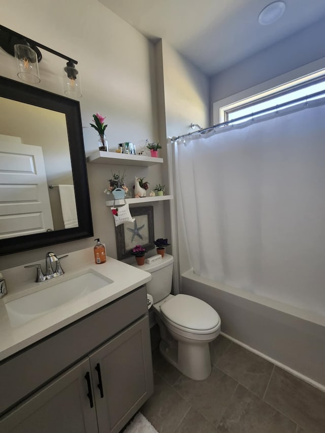 carpeted bedroom with a closet and ceiling fan