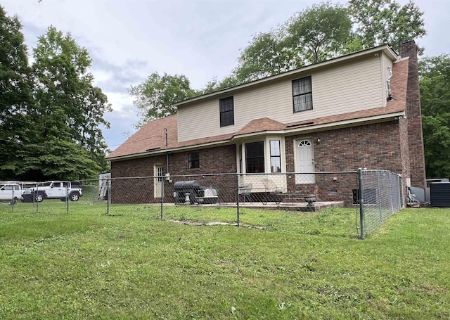 back of property featuring a chimney, brick siding, and cooling unit