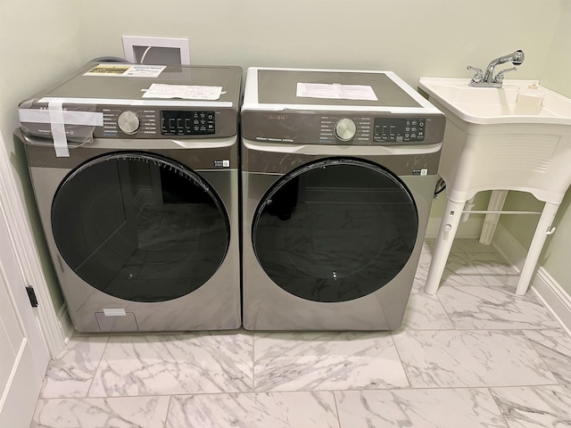 washroom featuring separate washer and dryer