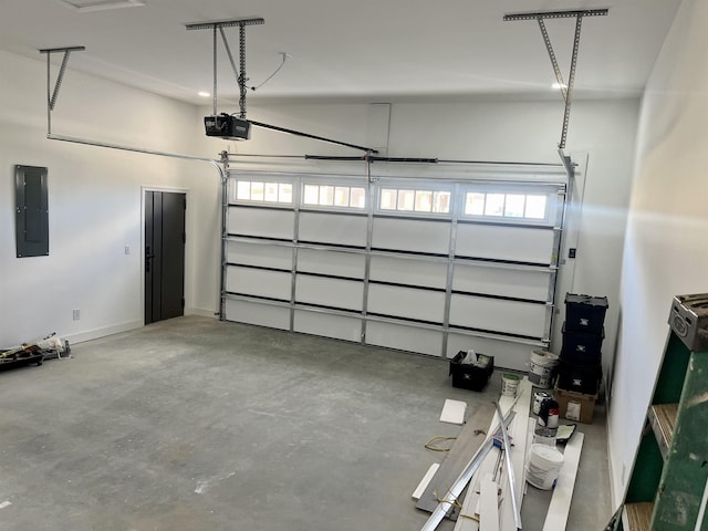 garage featuring a garage door opener and electric panel