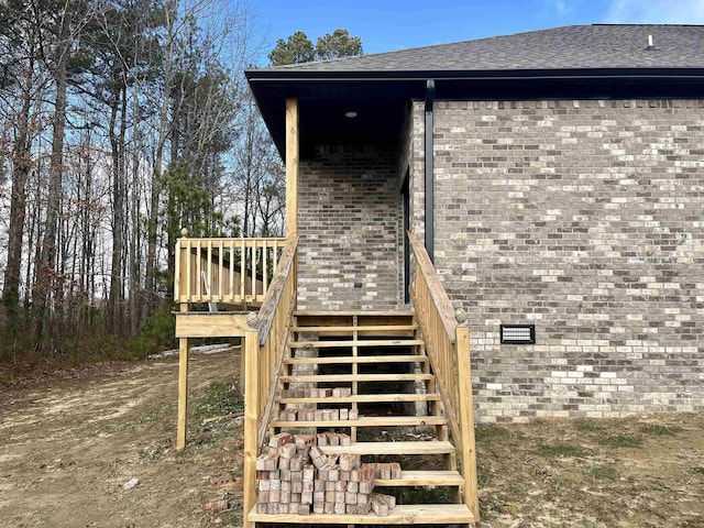 exterior space featuring a wooden deck